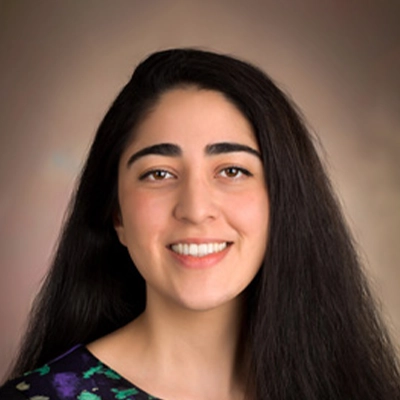 Pediatric Dentist Donya Dabiri Smiling In Colorful Shirt