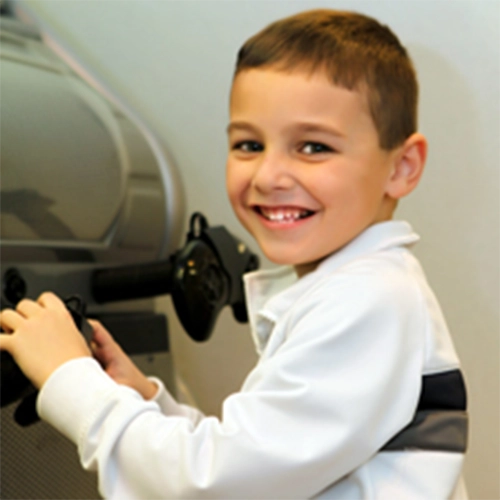 Pediatric Dentist Grosse Pointe Woods MI Happy Child HP Happy Child Playing In The Waiting Room At Toothworks