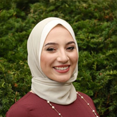 Pediatric Dentist Ranya Al-Hadidi Smiling In Hijab