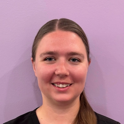 A headshot photo of Rachel